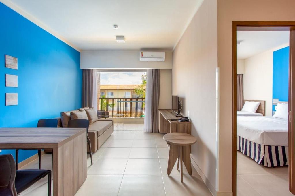 Sala, quarto e varanda integrados do apartamento